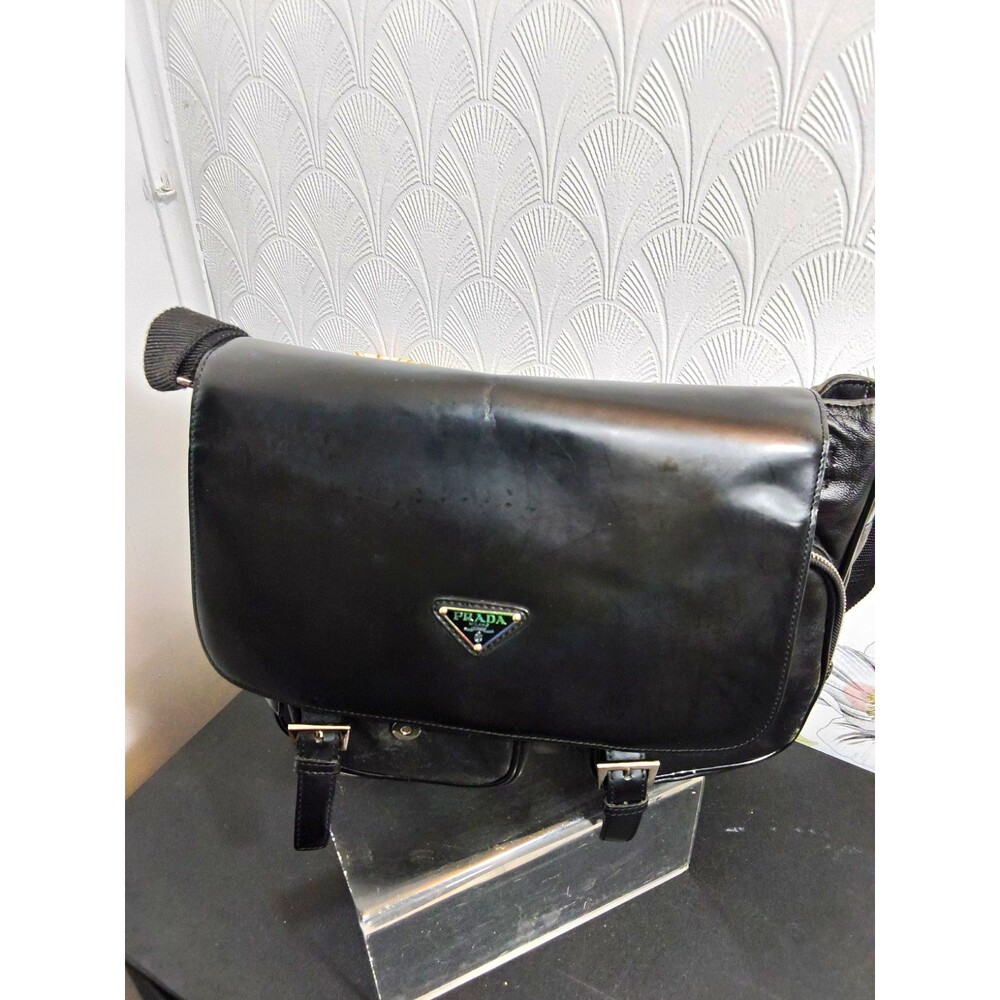 Prada Black Leather messager shoulder bag dual front pockets and buckled straps